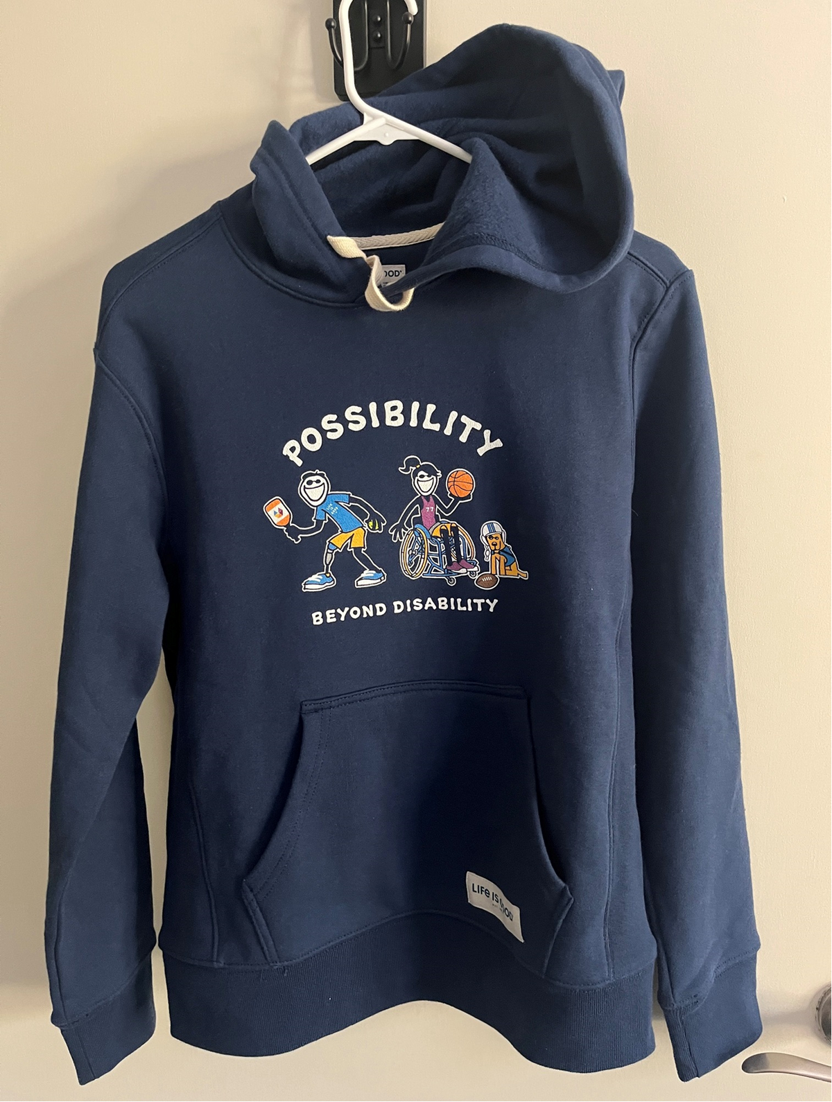 Front of navy Possibility Beyond Disability hoodie